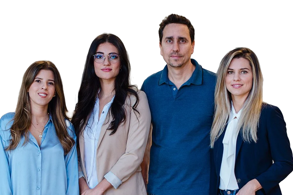 Four members of the LawRank team standing together in the office